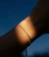 THE ROUND BEZEL ADJUSTABLE TENNIS BRACELET