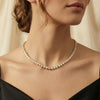 THE GOLD ICED OUT HEART TENNIS NECKLACE